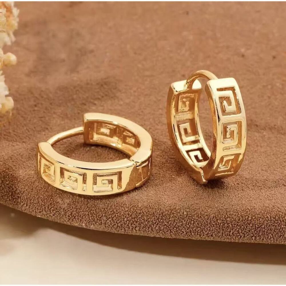 U-shaped loop earrings with a vented hollow section.